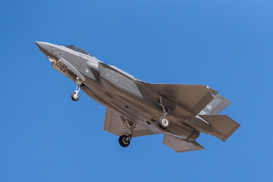 Australian F-35 fighter jet, key to defence & finance impact of AUKUS nuclear submarines.