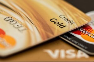 Australia Golden Visa: Gold credit cards signify investment and finance opportunities.