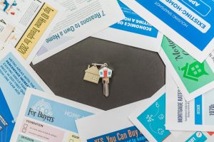 Australia housing market: labor budget impact with real estate brochures and key