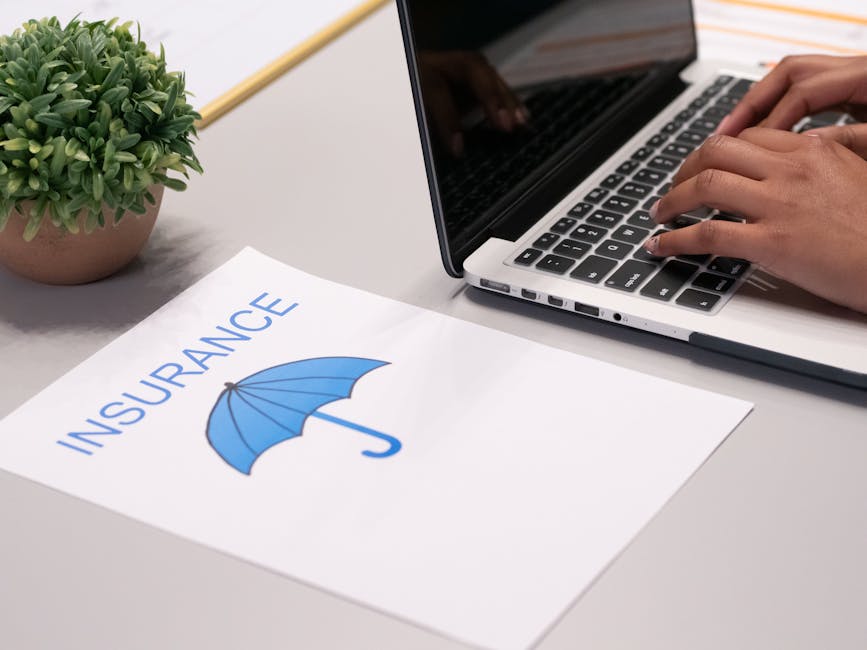 Insurance claim: Hands type on laptop near luxury car dealership heist insurance document, Australia.