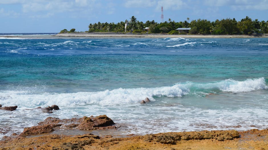 Nauru deal survivor alleges abuse: rocky Australian beach backdrop