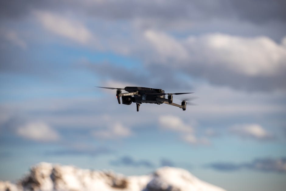 Australian defence drone protecting critical infrastructure over snowy mountains