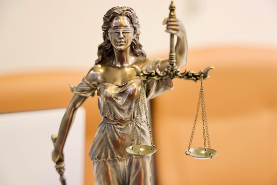 Australian Lady Justice statue, symbolizing judicial independence in justice system debate.