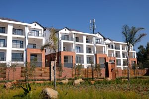 Sydney property market: $1m flat with broken shower, modern apartment complex facade
